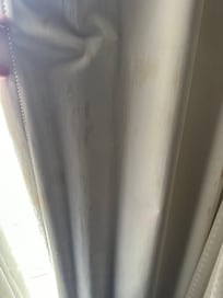 Stained blackout curtains