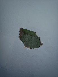 Large hole in bedroom wall