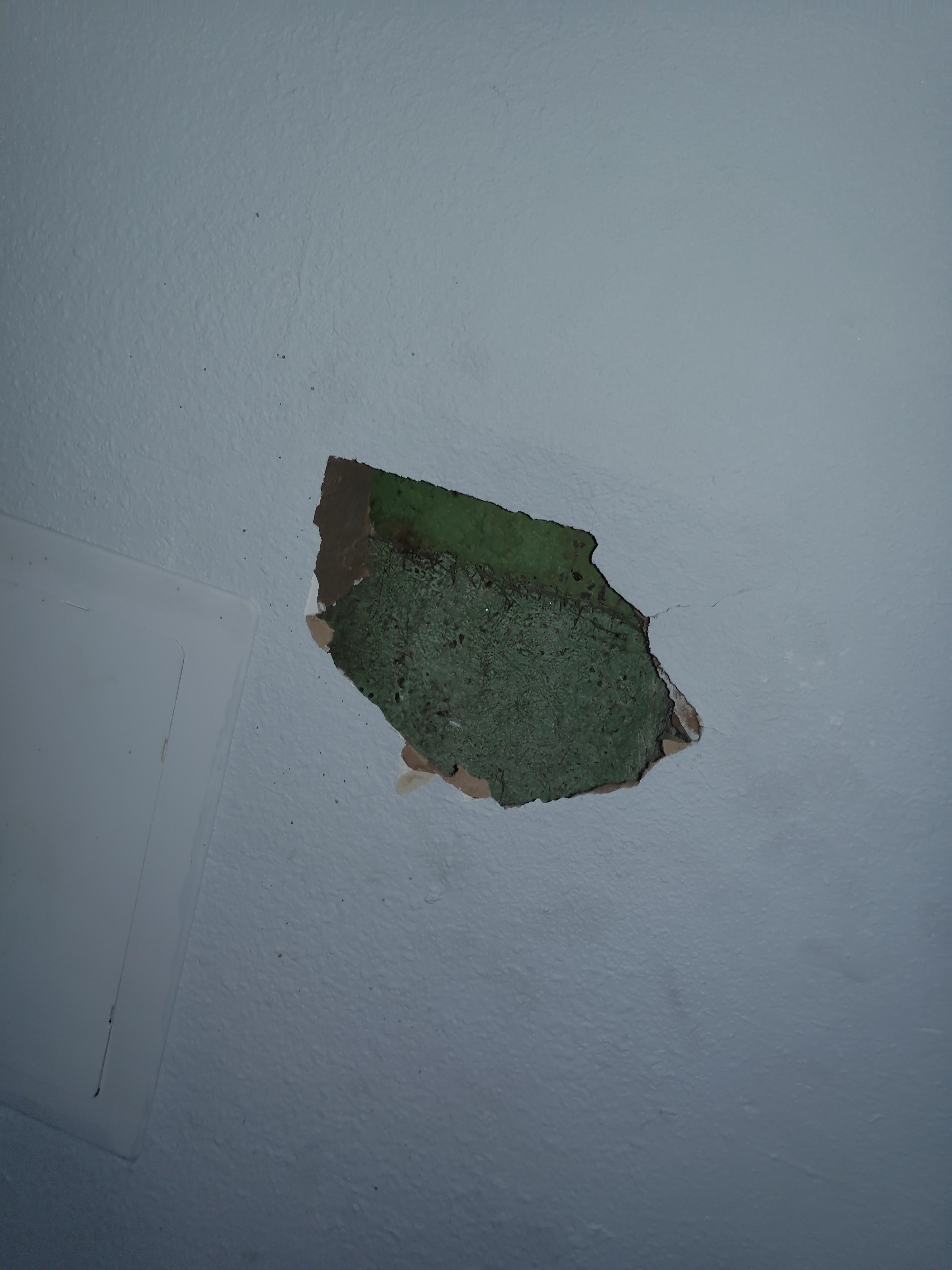 Large hole in bedroom wall