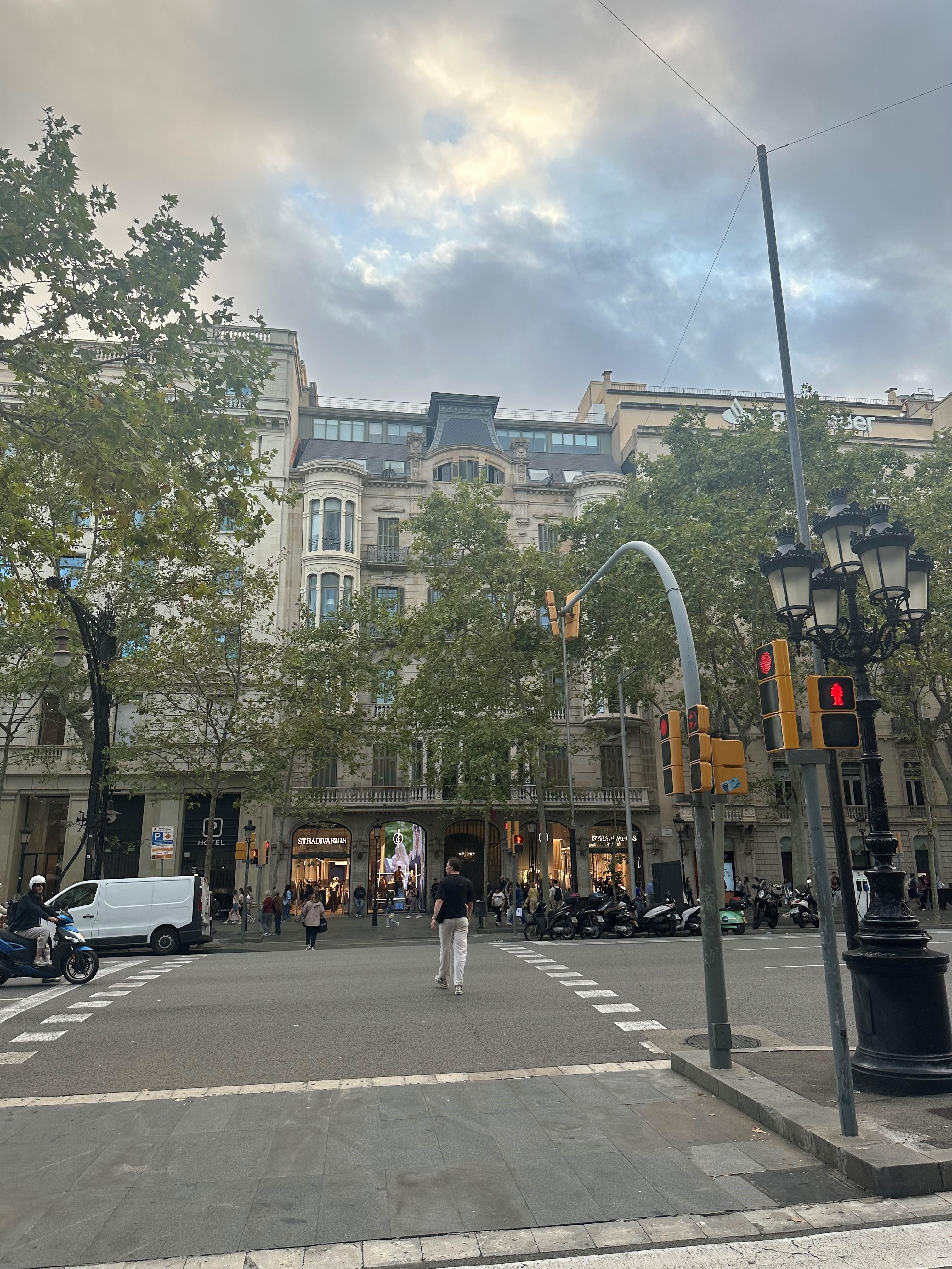 Looking at building from across the street. Apartment is right half of top floor, plus terrace above
