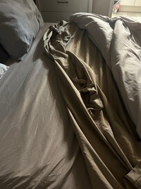 The top sheet on the bed was “used”