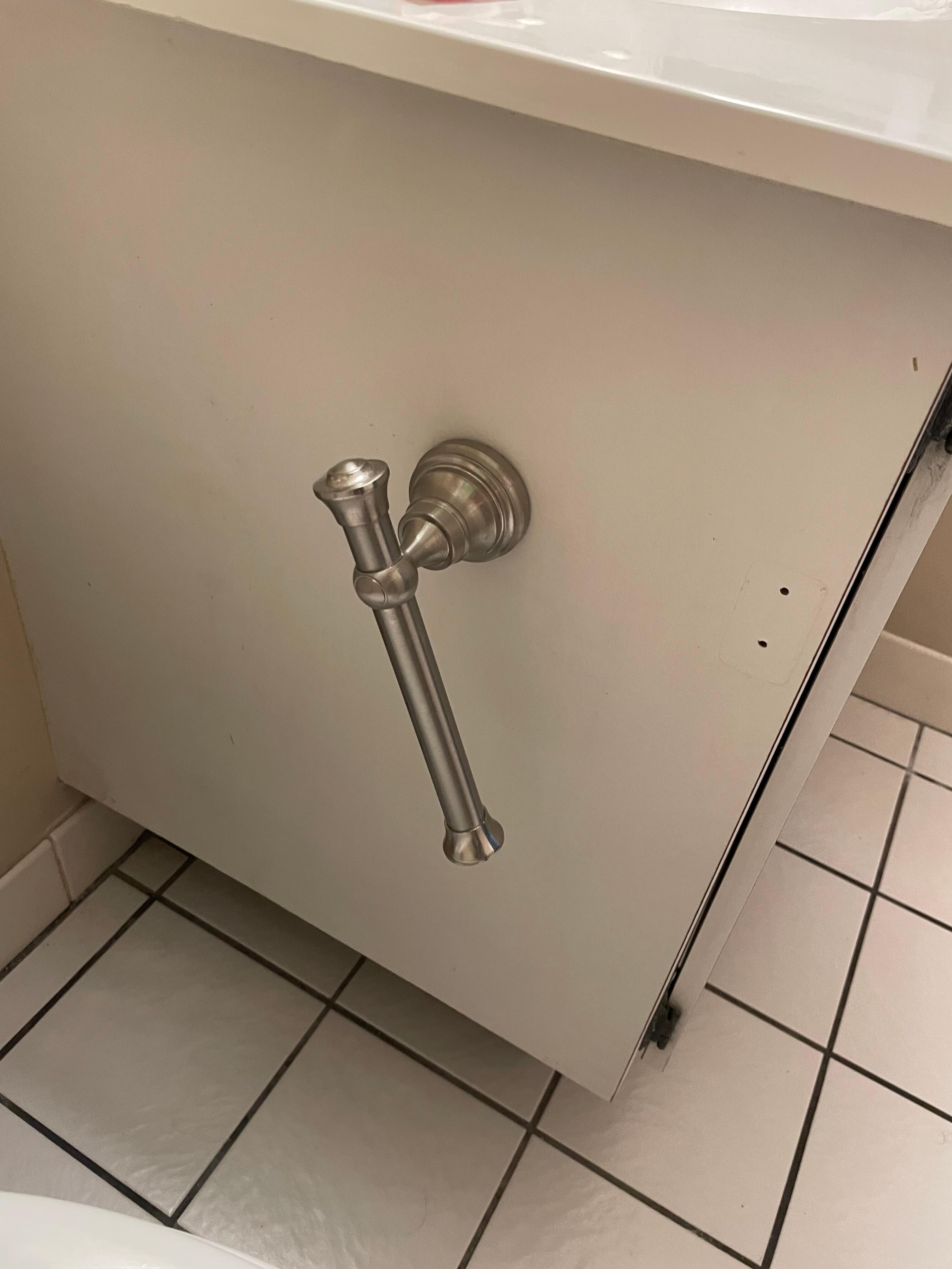 Broken toilet paper holder