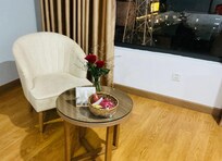 Welcome roses and fruit basket.