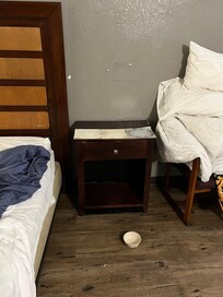 Furniture non-hygienic, covered with stick and peel plastic tile.