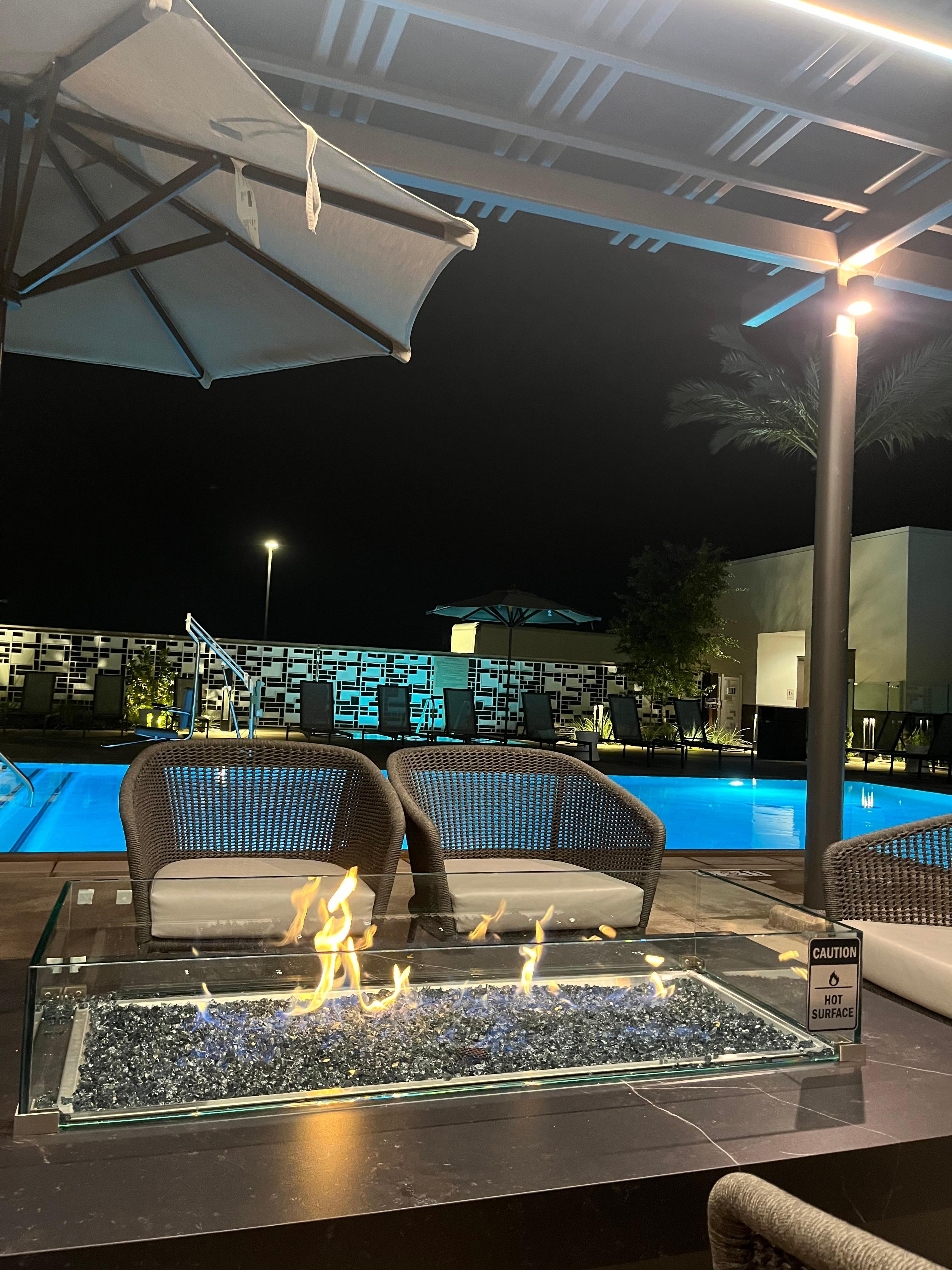 Fireplace next to pool 