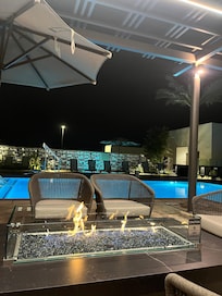 Fireplace next to pool