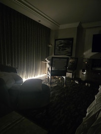 Bright sun coming from under curtains.