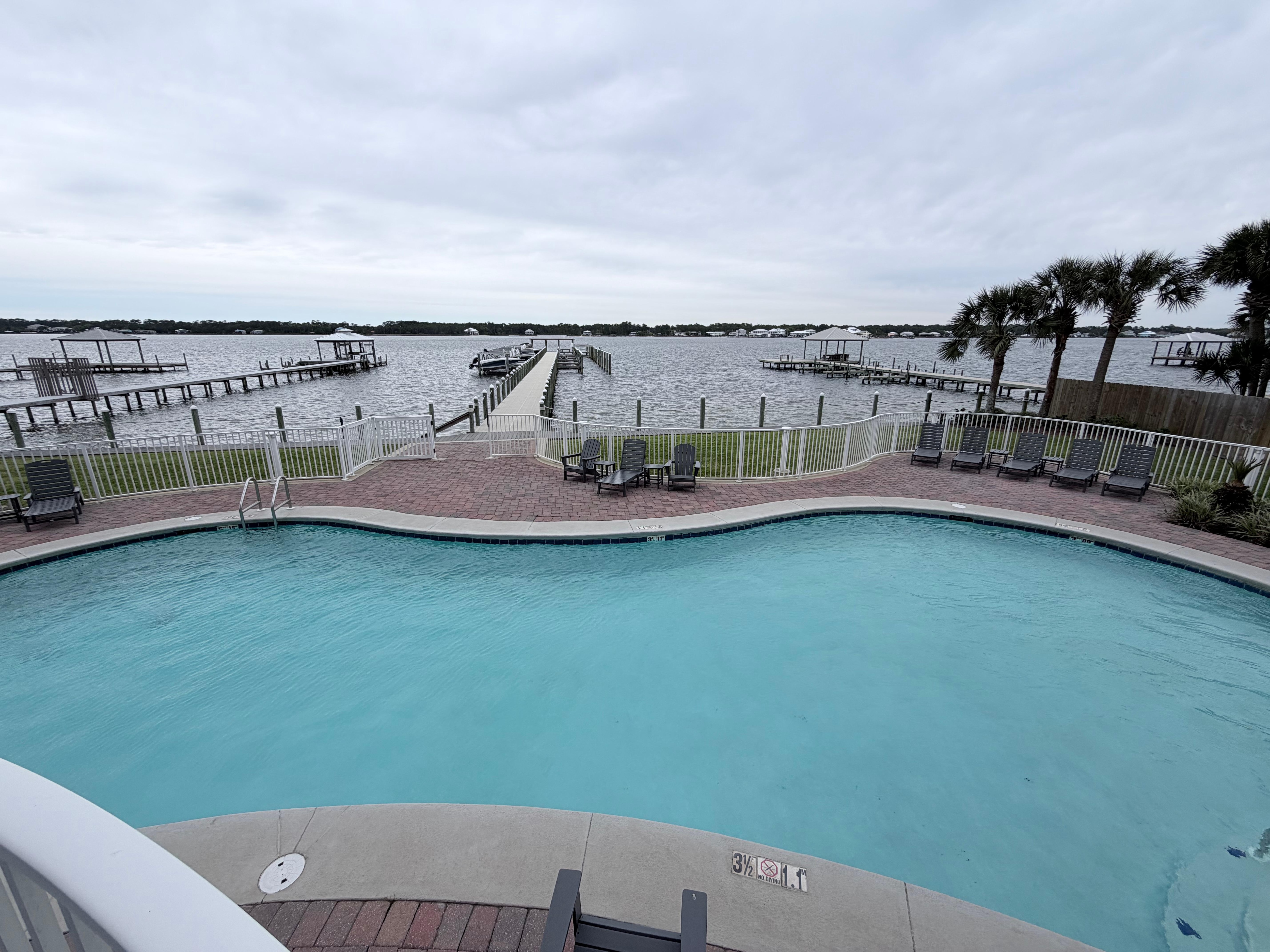 Outdoor pool not heated but pretty and has a ledge for lounging. 