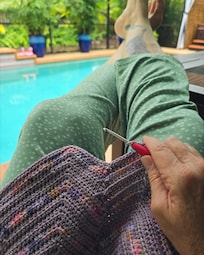 Crocheting by the pool every morning