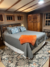 Comfortable bed…liked the side niche with lamp.