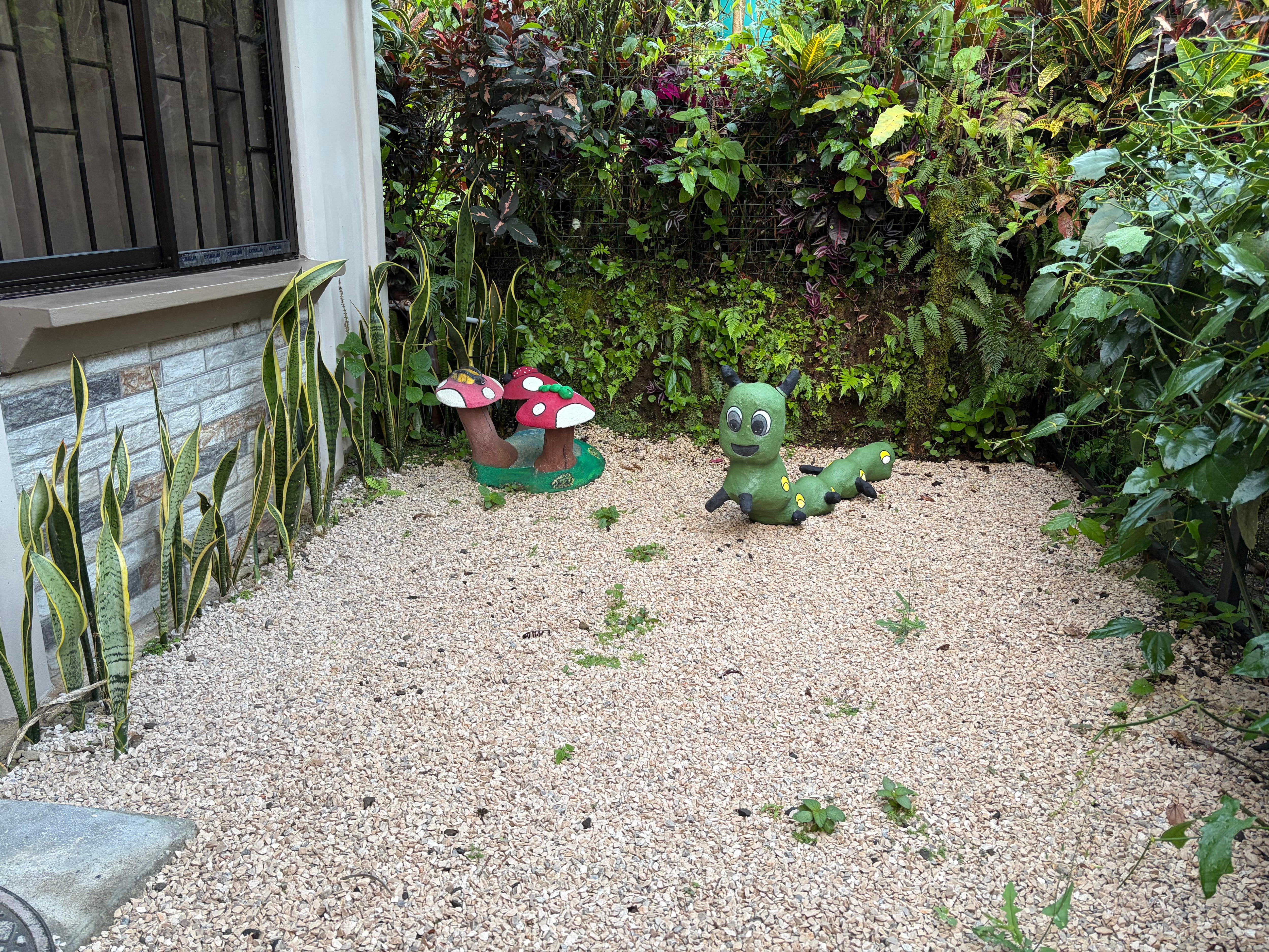 Small gravel yard in front and parking space for 2 cars in front of this space. 