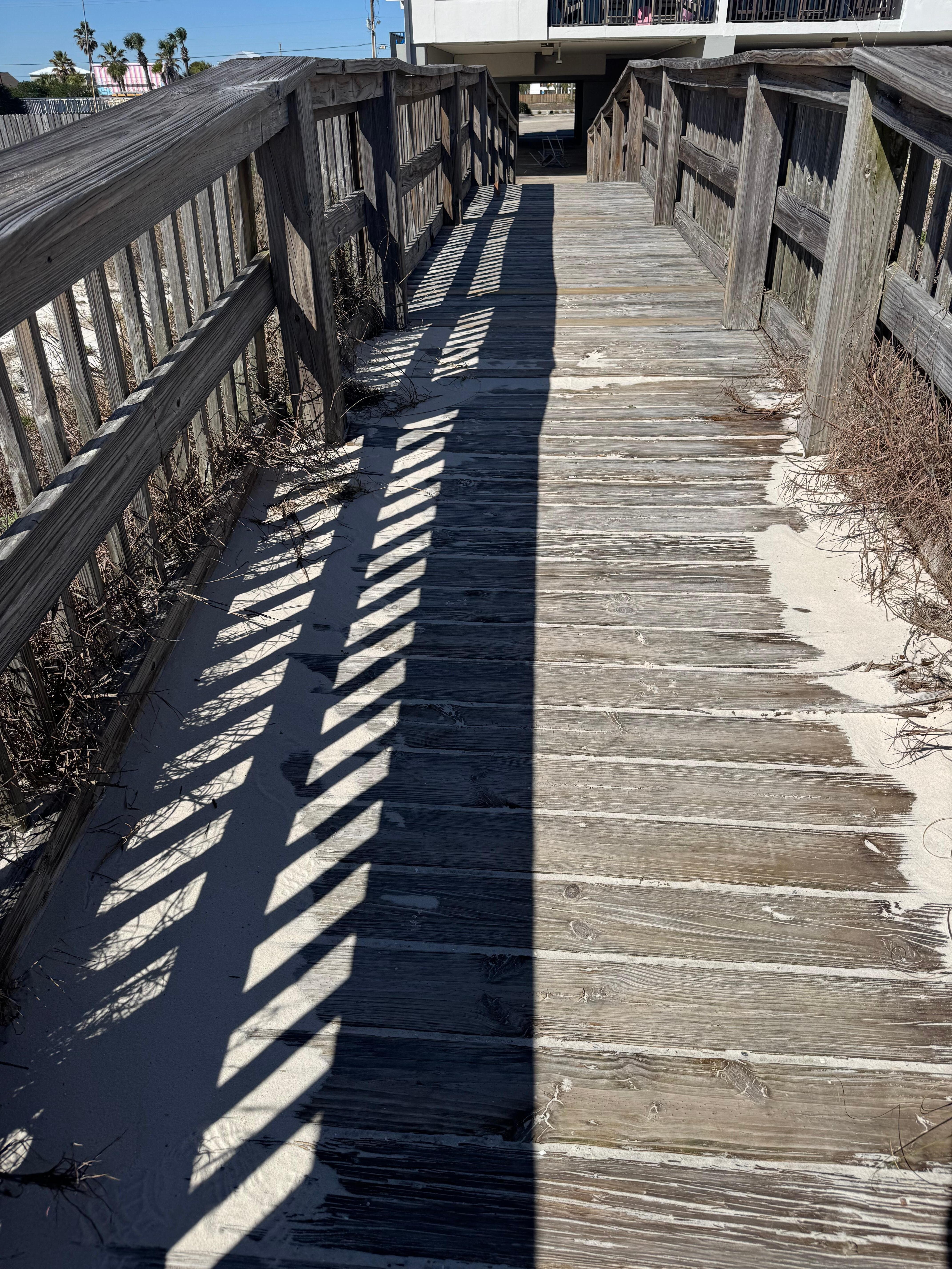 Walkway to between condo and beach. 