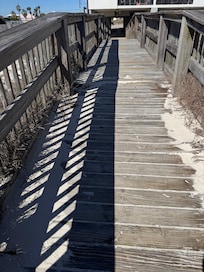 Walkway to between condo and beach.