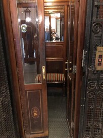 An amazing antique elevator brings you to floor #1 to the reception and bedrooms.