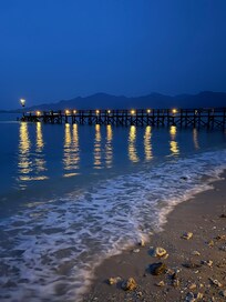 The hotel pier at night.