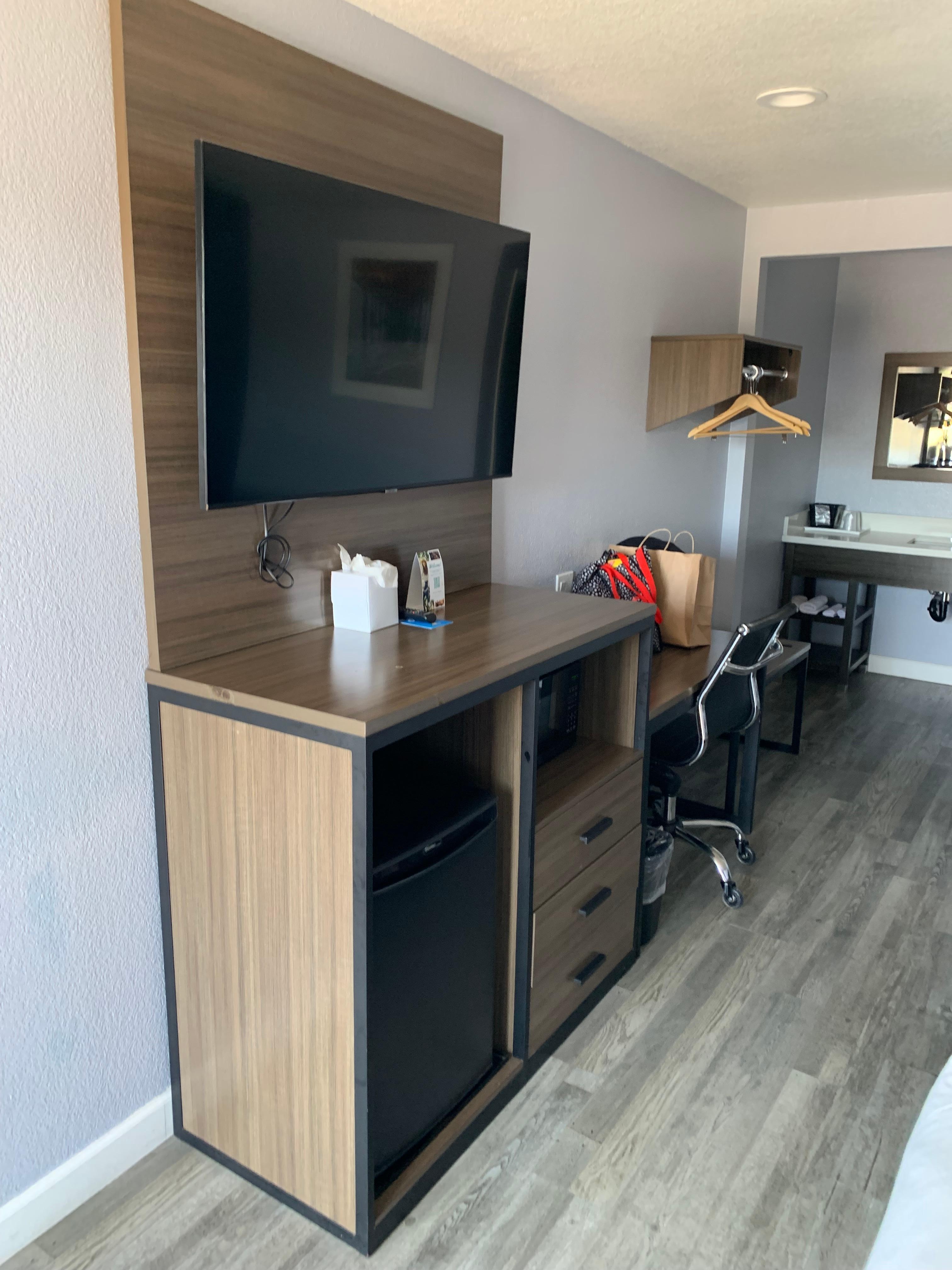Refrigerator, microwave, and tv.