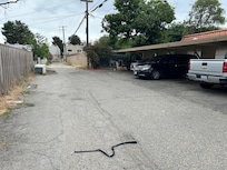 Picture of parking area. The leash in the road was removed from my car from a beloved dog.
