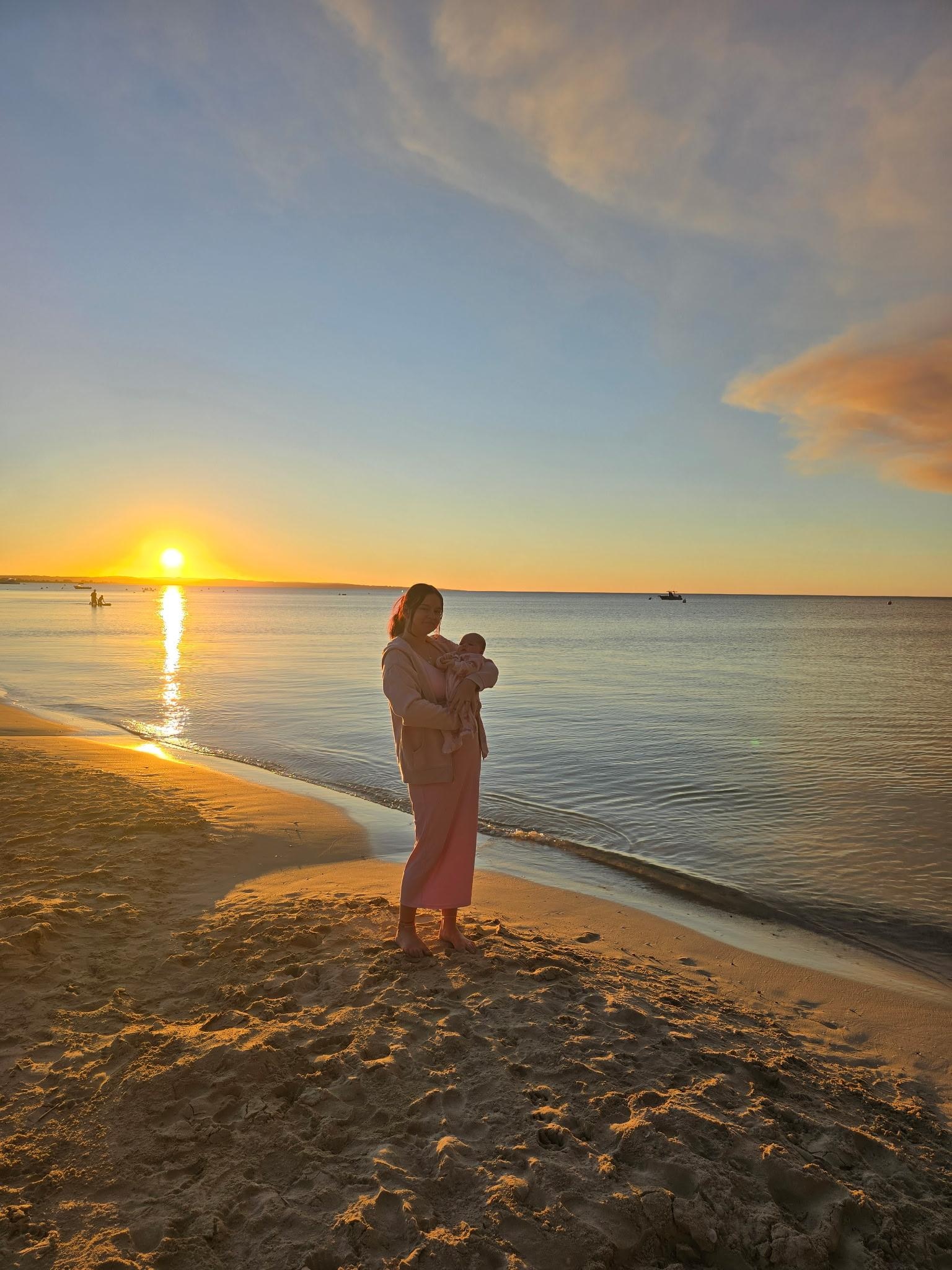 Holly with Skye for her first ever beach sunset