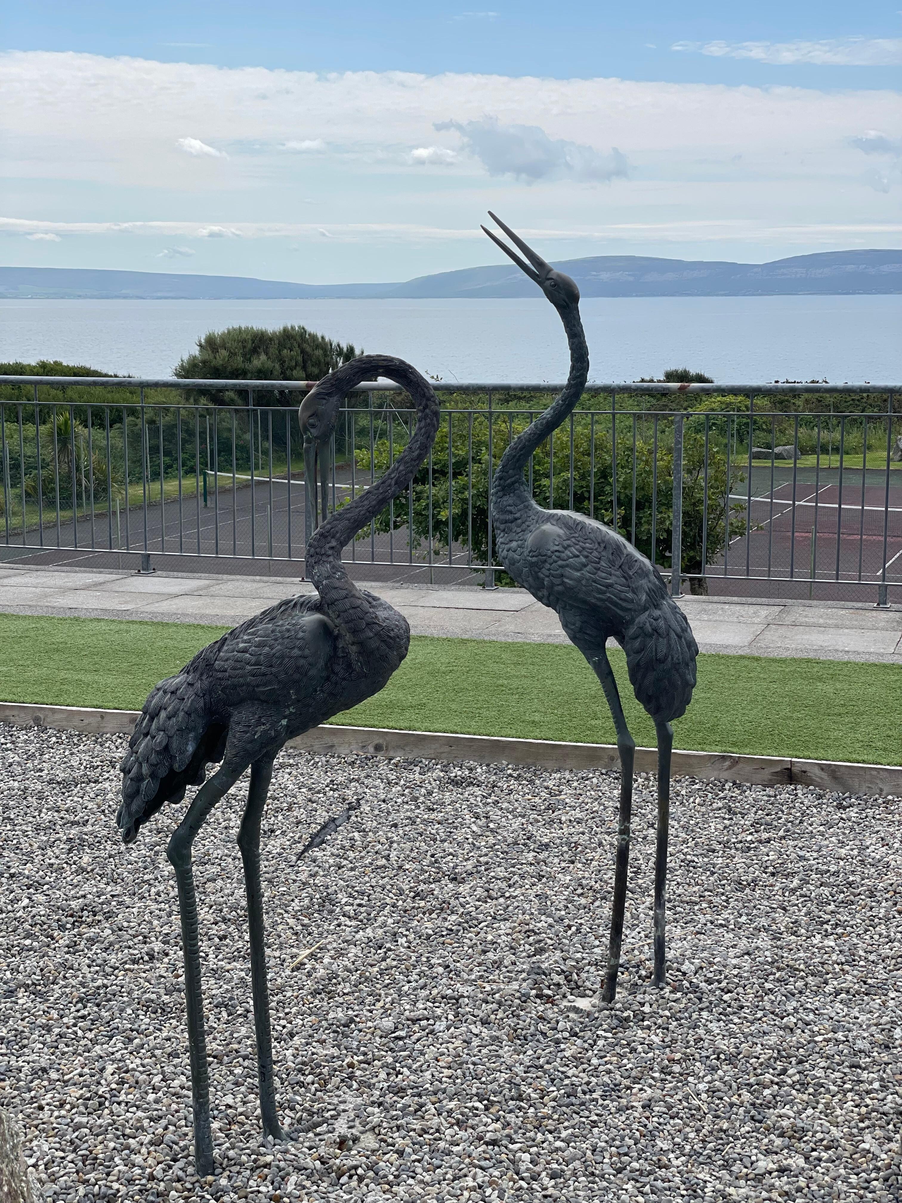 Heron statues