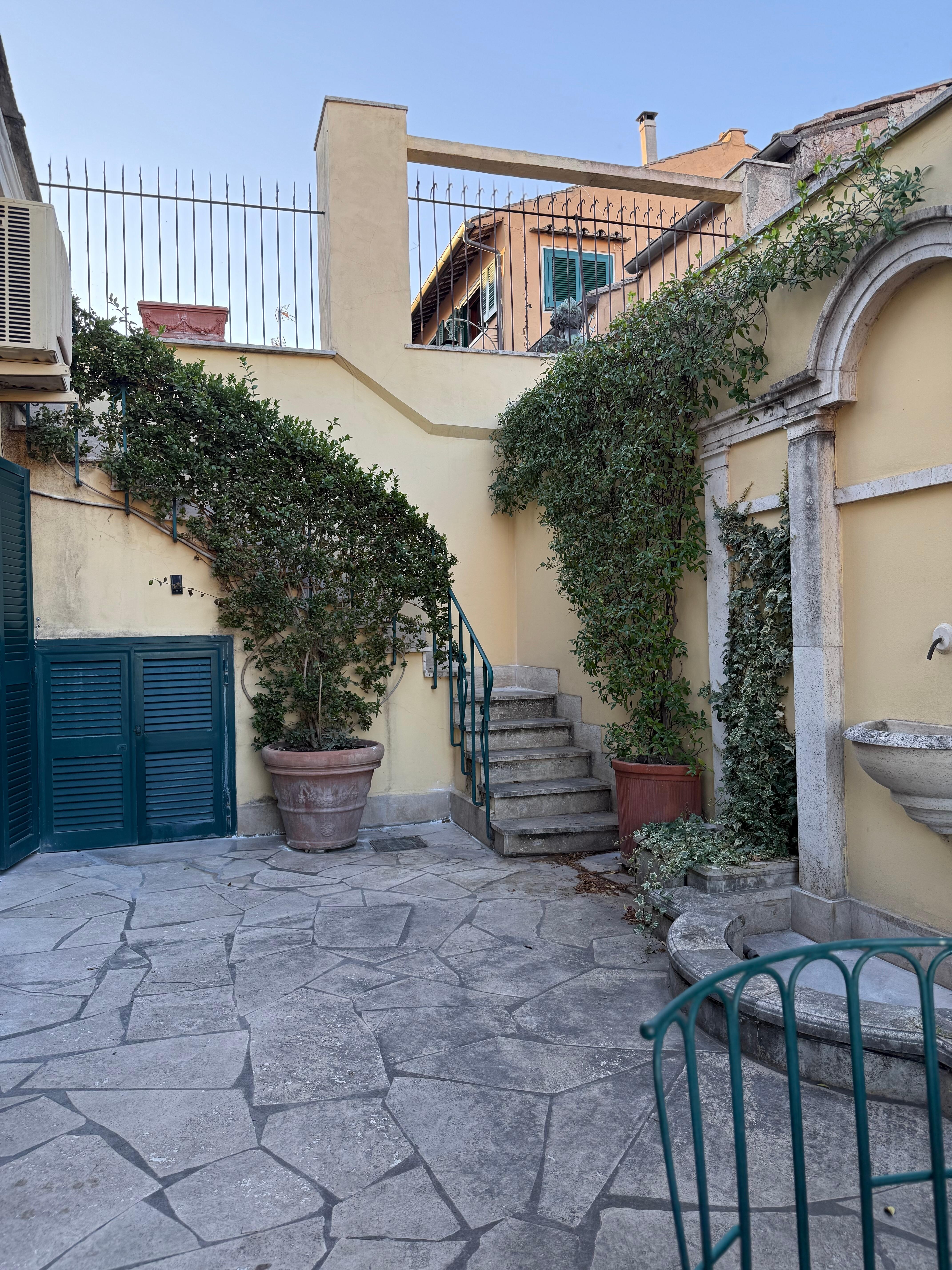 Steps to the upper patio 