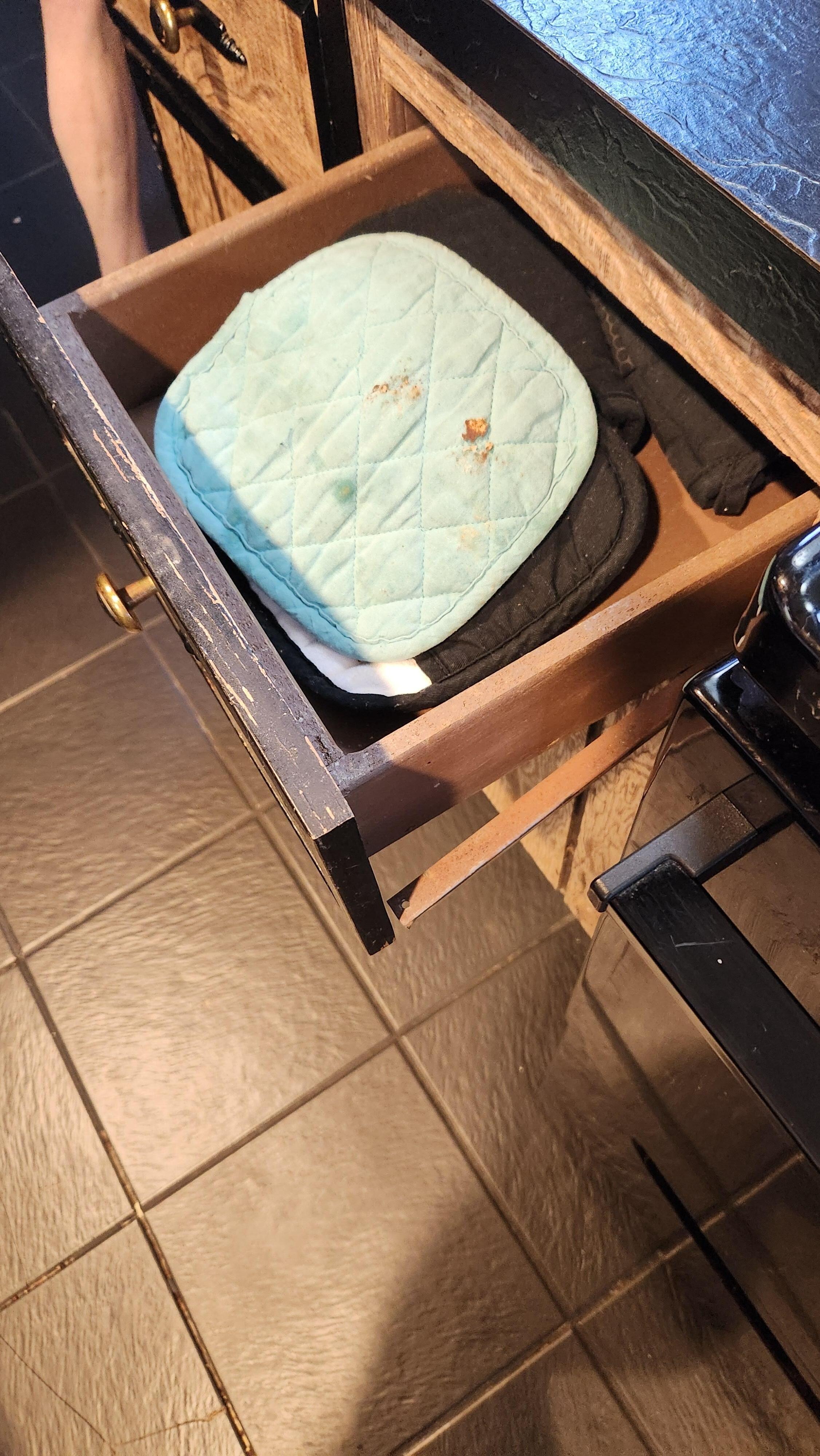 Dirty potholders put away