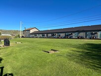 Wide angle of the back of the “river rooms.”