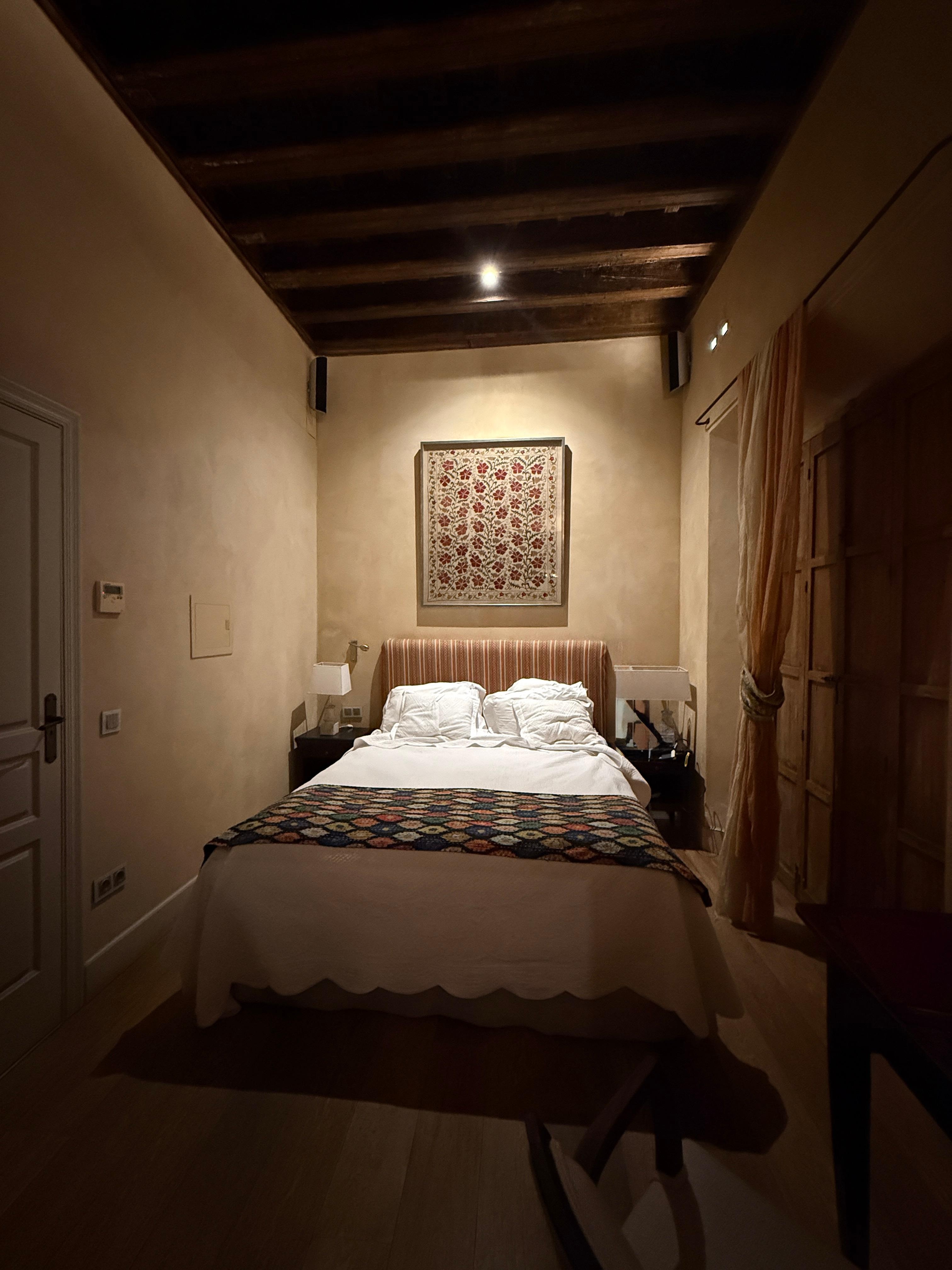 Bed with cool ceiling.