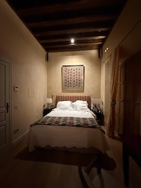 Bed with cool ceiling.