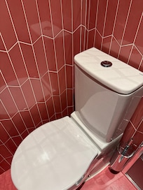 Toilets with a 2 inch separation form wall - how can anyone think this is useable