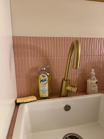 Faucet in kitchen was very loose and difficult to use.