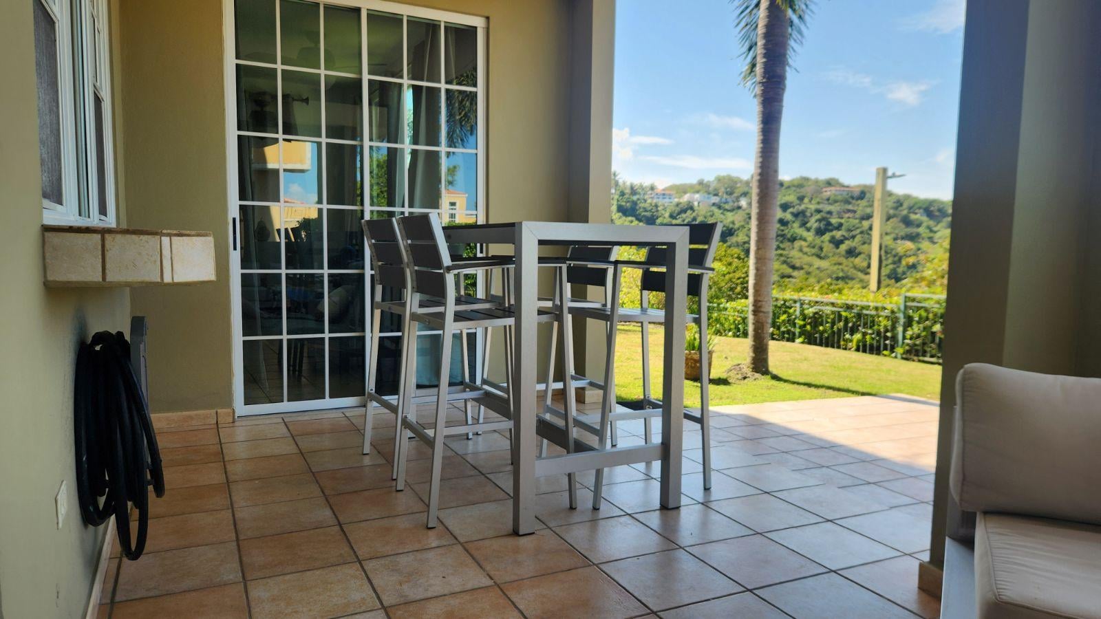 Huge covered patio with ceiling fans