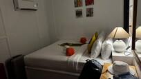 room we did not book - bedroom - no window except a shutter that opened but no glass. air con works. on the beach.