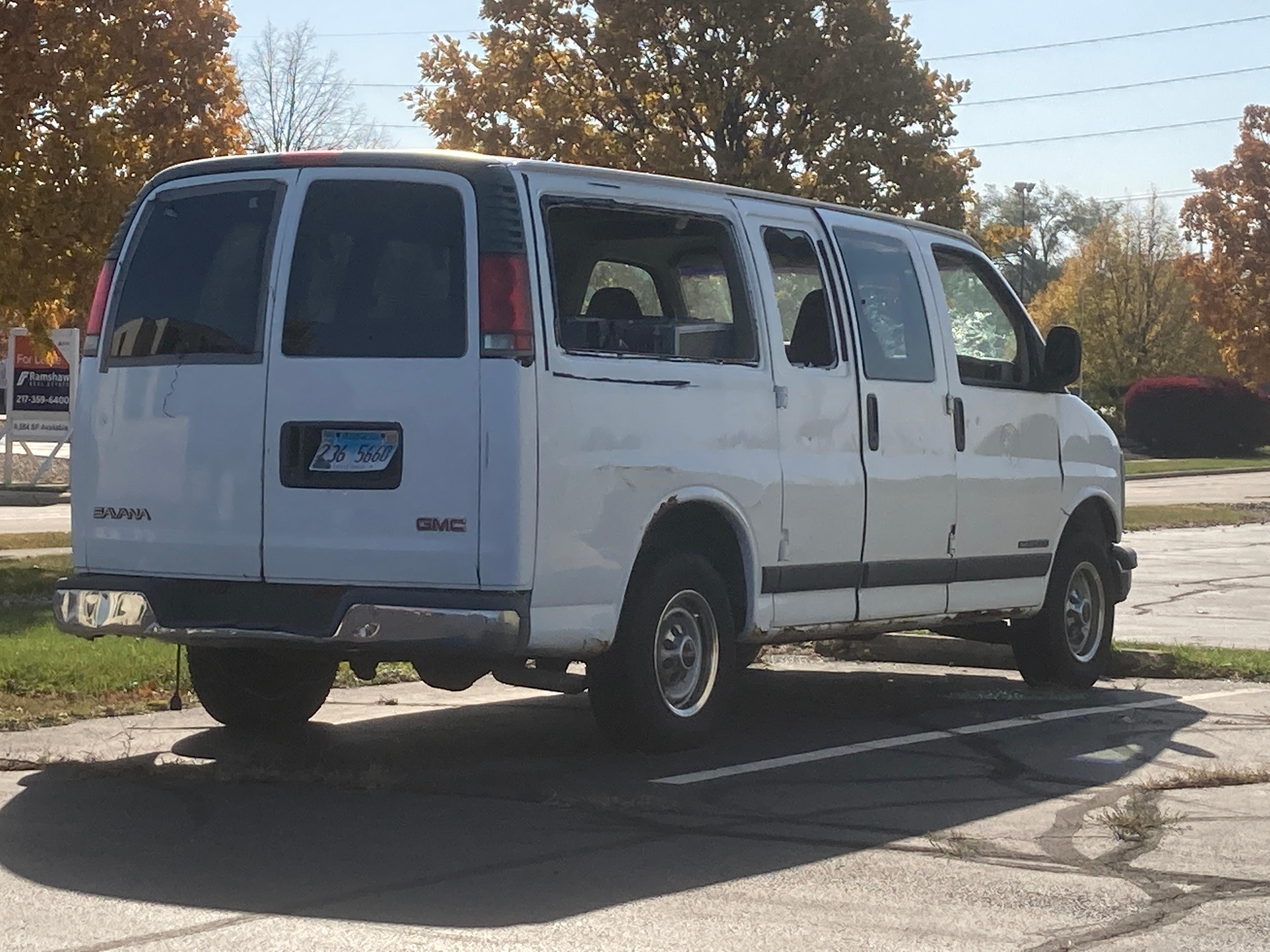 Van in hotel parking lot