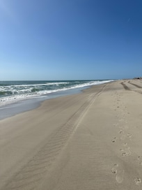 Wide sandy beach that was almost completely empty