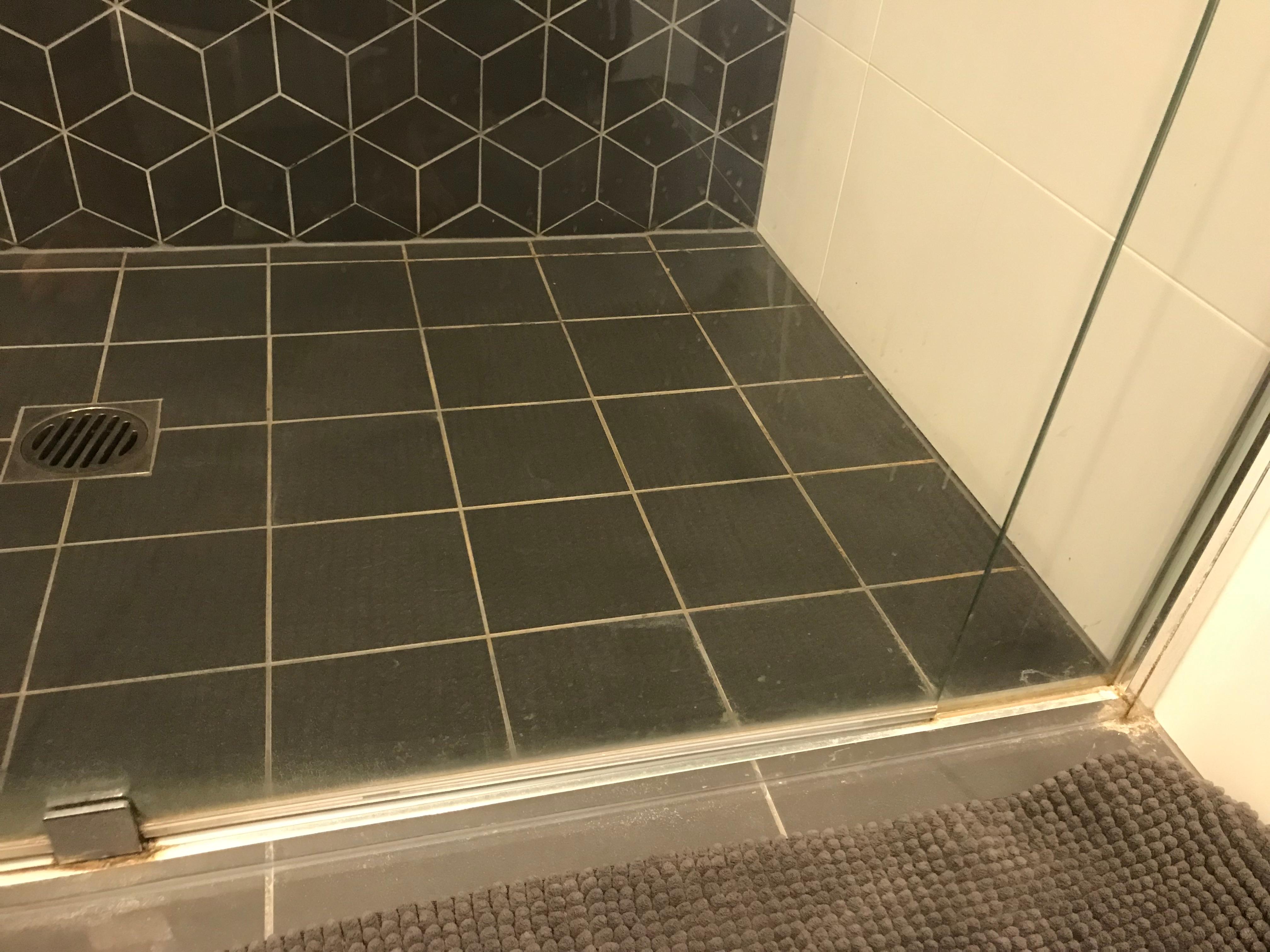 Dirty glass and grout. Probably wouldn't have felt like a big deal if everything else had gone smoothly...