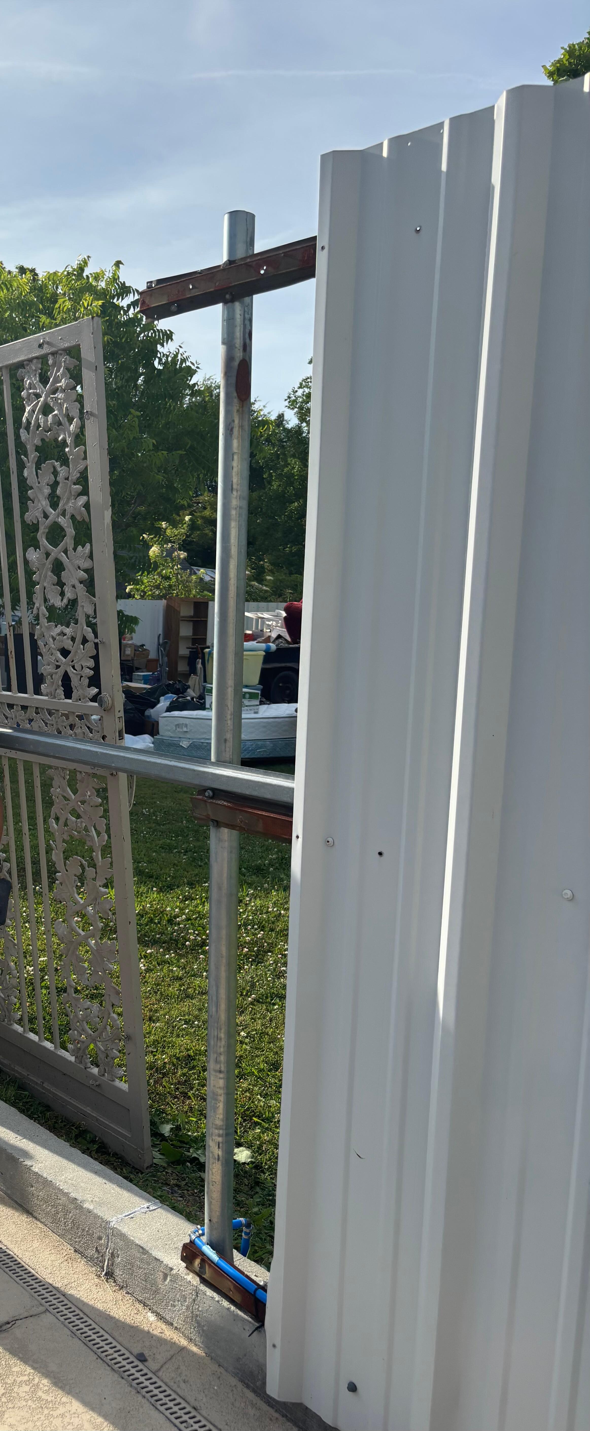 My husband and I moved the gate to try and get privacy. The metal sheeting was missing!