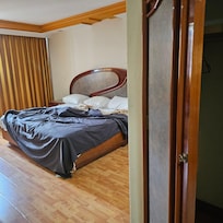 One person bedroom withprivate bathroom.