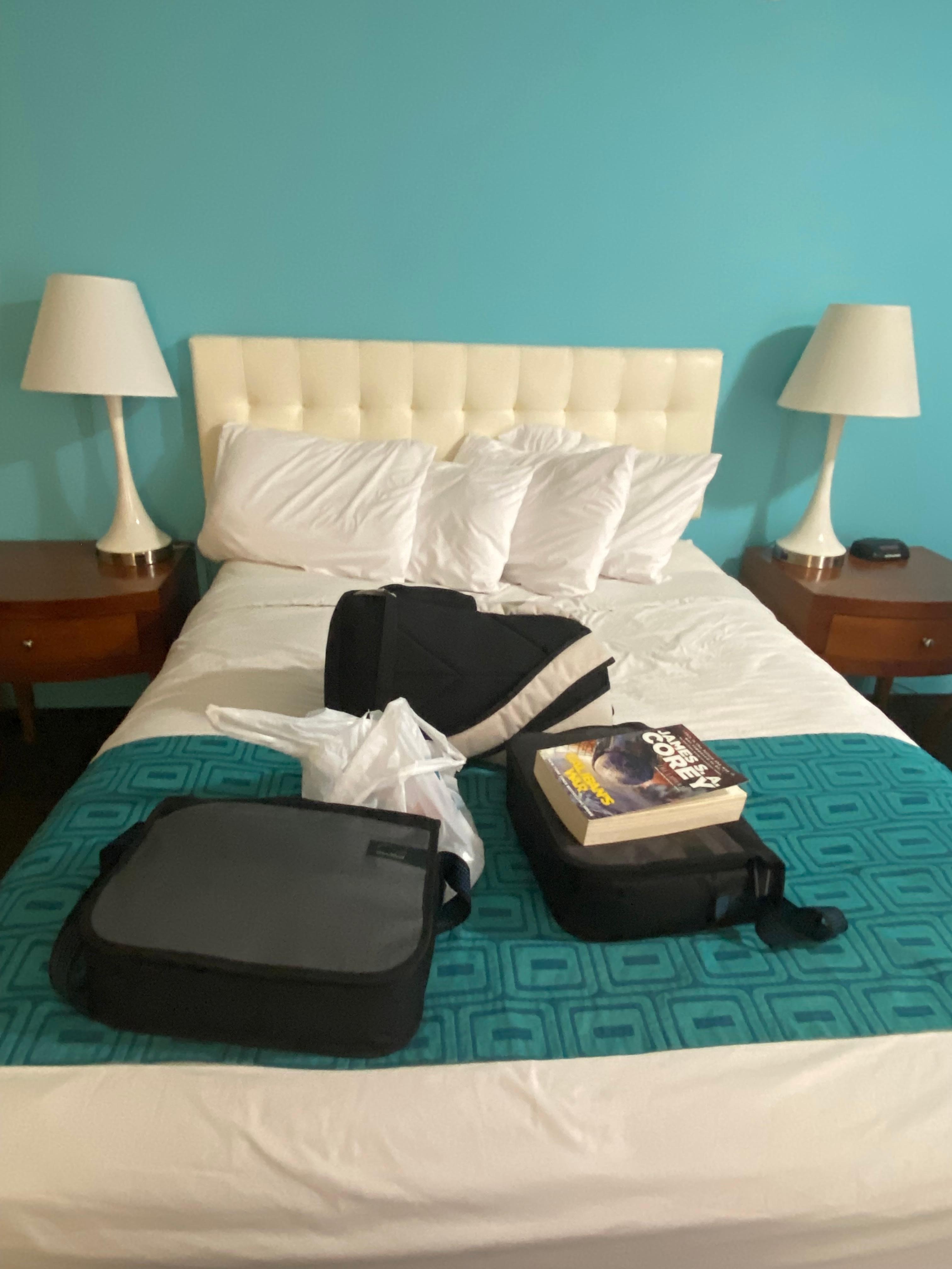 Full-size bed, advertised as queen