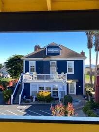 Main building with lobby, dining room, and cozy living room