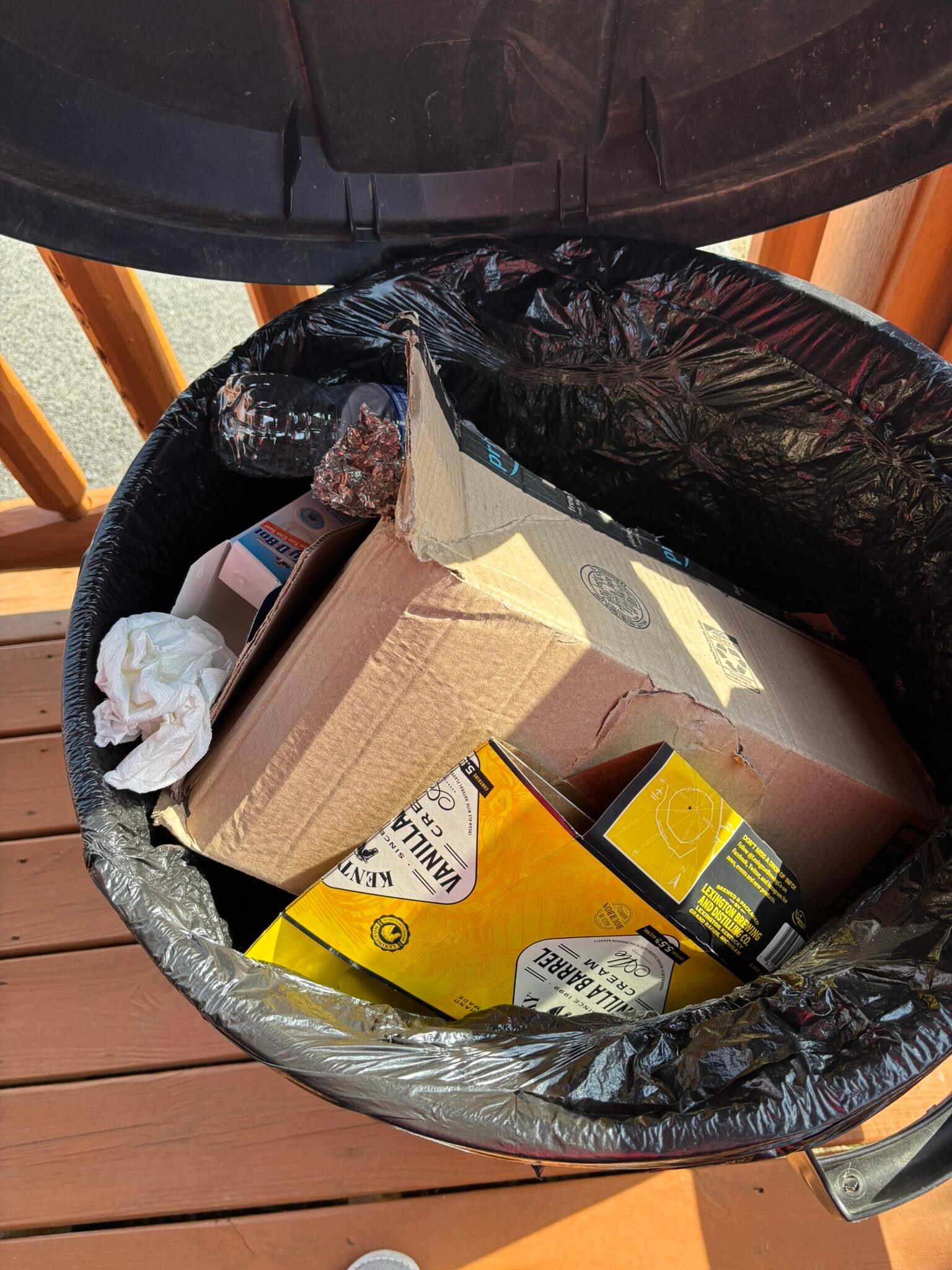 Front porch garbage can was full upon arrival.