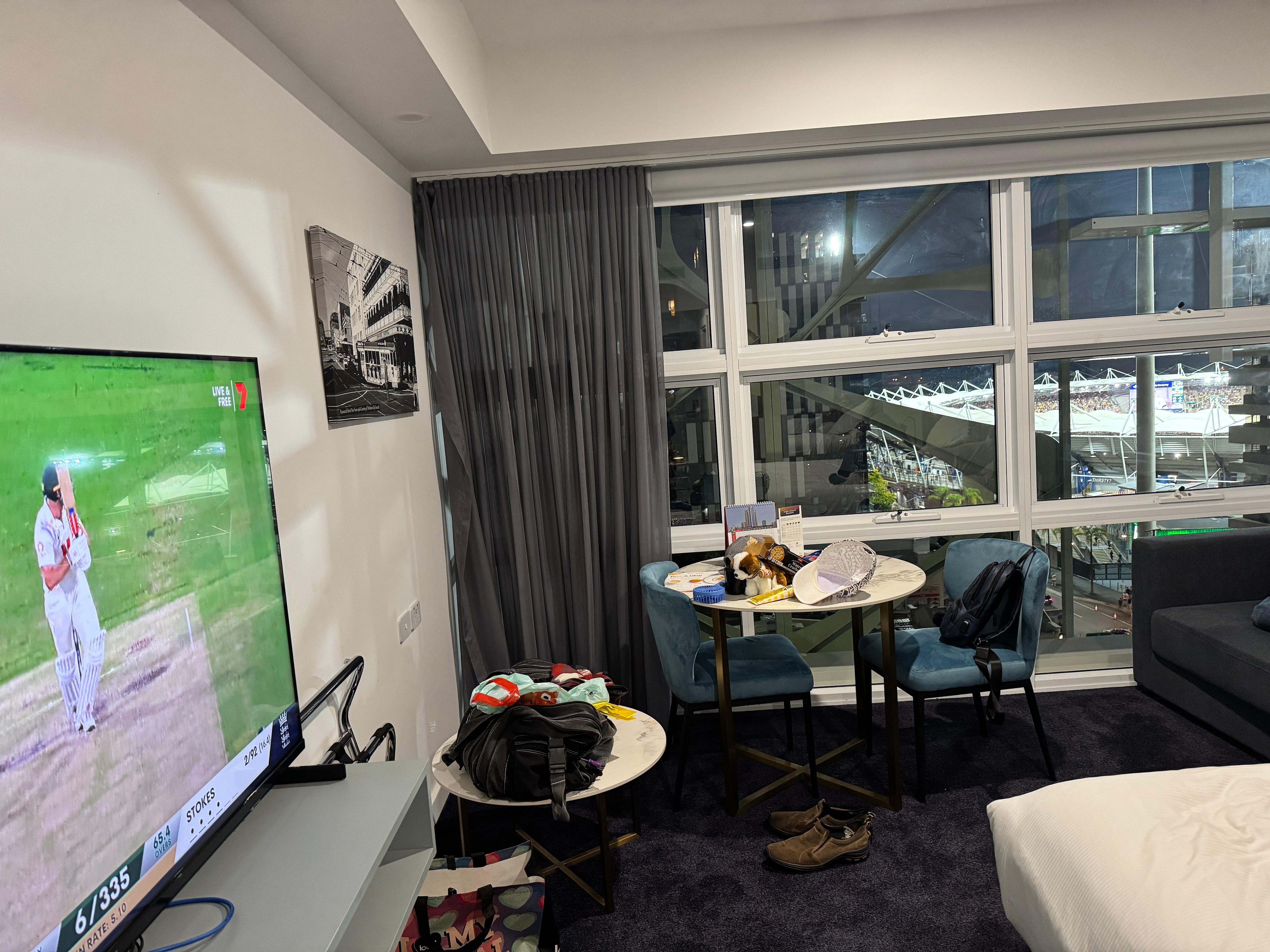 Watching the cricket while watching the stadium 