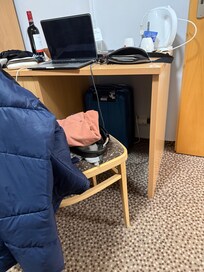 You can use the desk if you remove the fridge