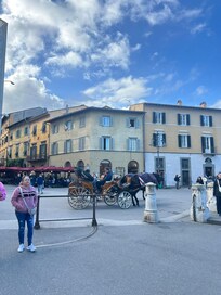 Rooms are on the 1st and 2nd floor of the corner building. If faces the square just in front of the Pisa tower. I’m standing by the tower taking this photo.