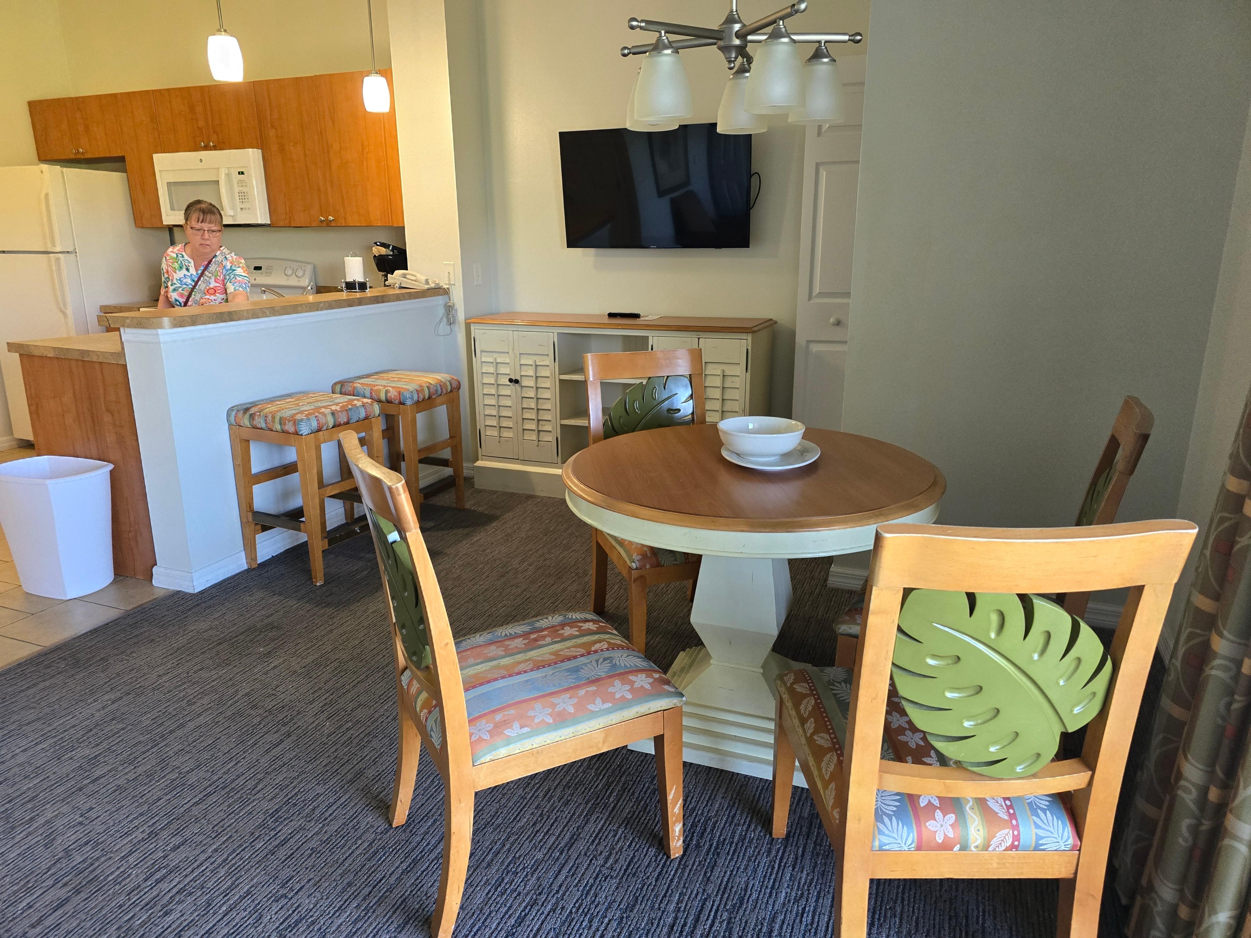 Dining area with the small tv for the living room.