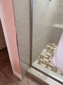 Shower wall pulling off