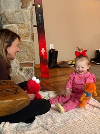 Dede playing w RK in living room.