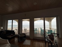 Wall to wall windows with view of the Gulf