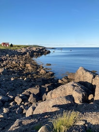 Access to rocky shore.