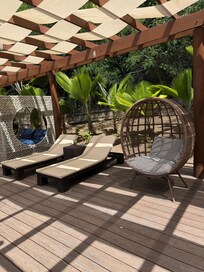 Relaxing chairs at the Diamond club pool