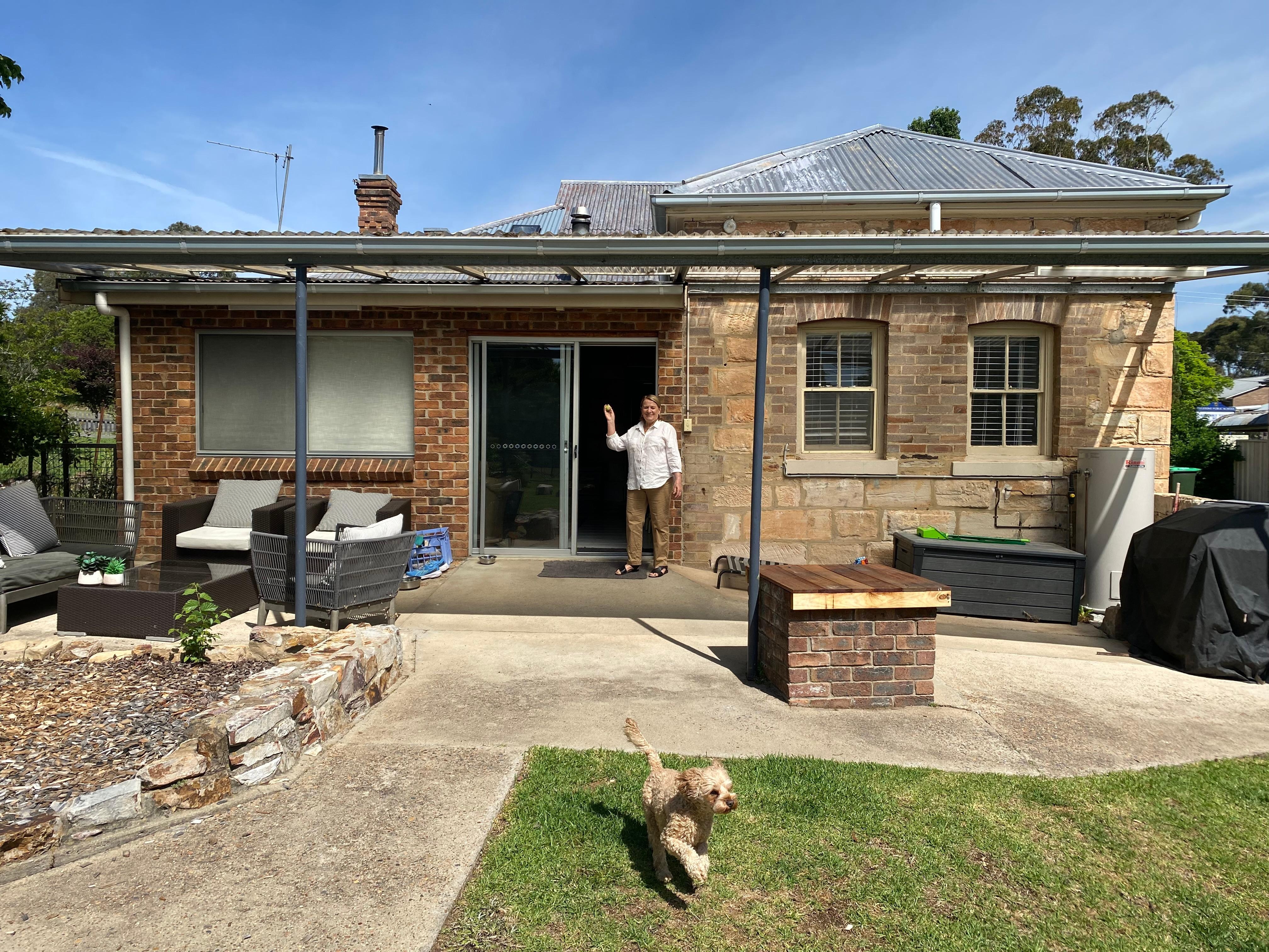 Rusty enjoying the big back yard